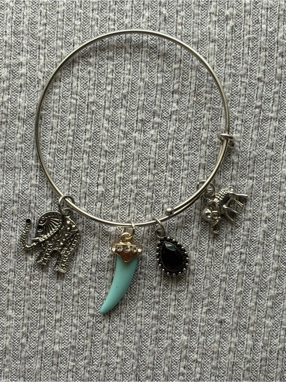 Bohemian silver tone adjustable bangle w turquoise, elephant& black stone charms